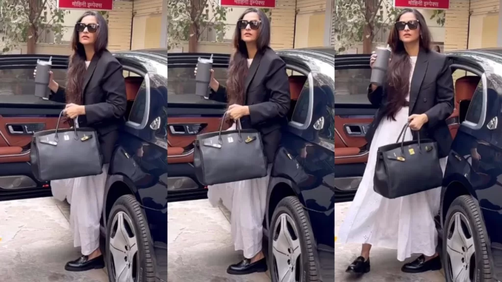 Sonam Kapoor's Effortless Style: Black Blazer Elevates White Dress Ensemble