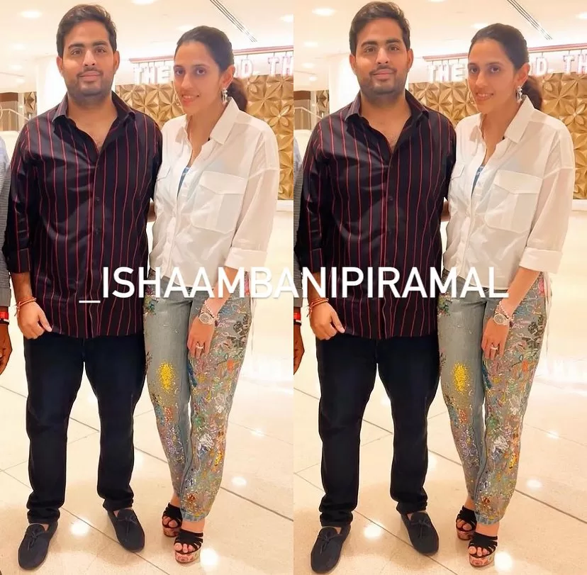 Akash Ambani and Shloka Mehta's Stunning Pose: Shloka's Rs. 79K Sequined Jeans Turn Heads at NMACC Event!