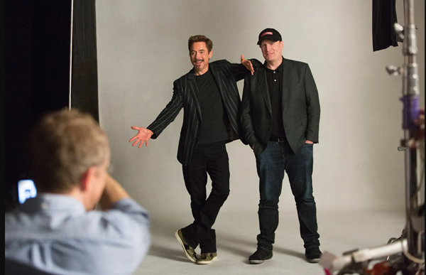 Robert Downey Jr. with the MCU president Kevin Feige