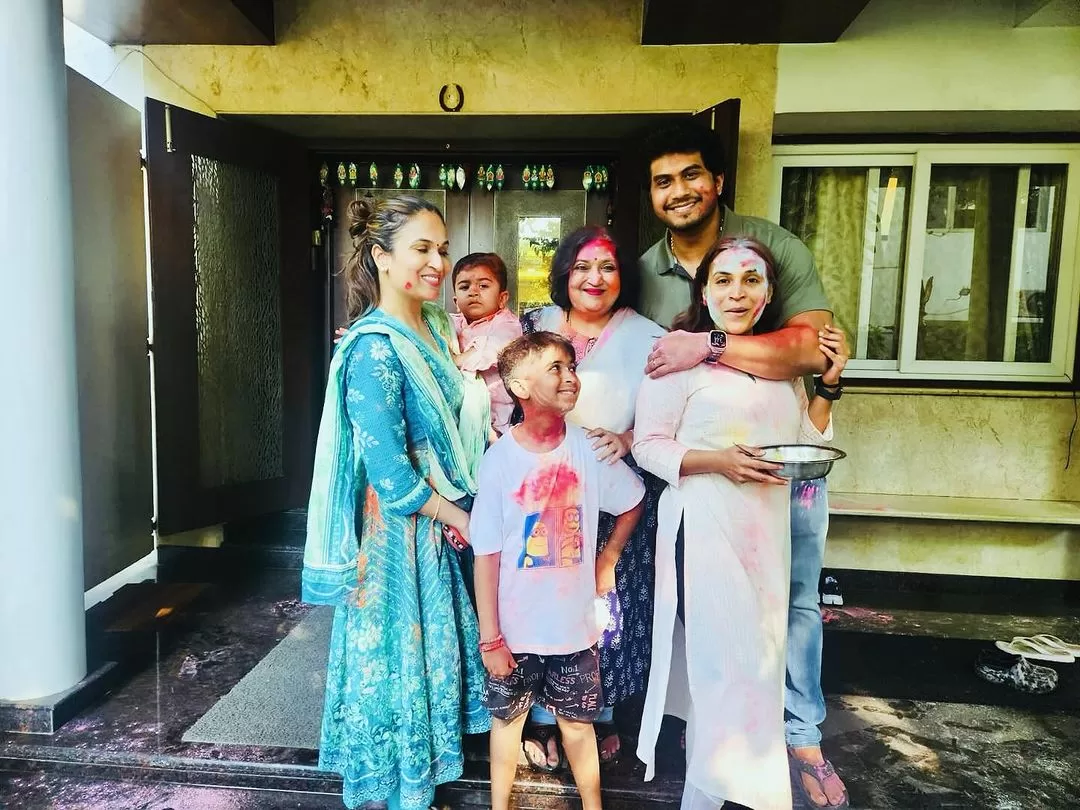 Superstar Rajinikanth having fun with his kids and grandchildren during Holi