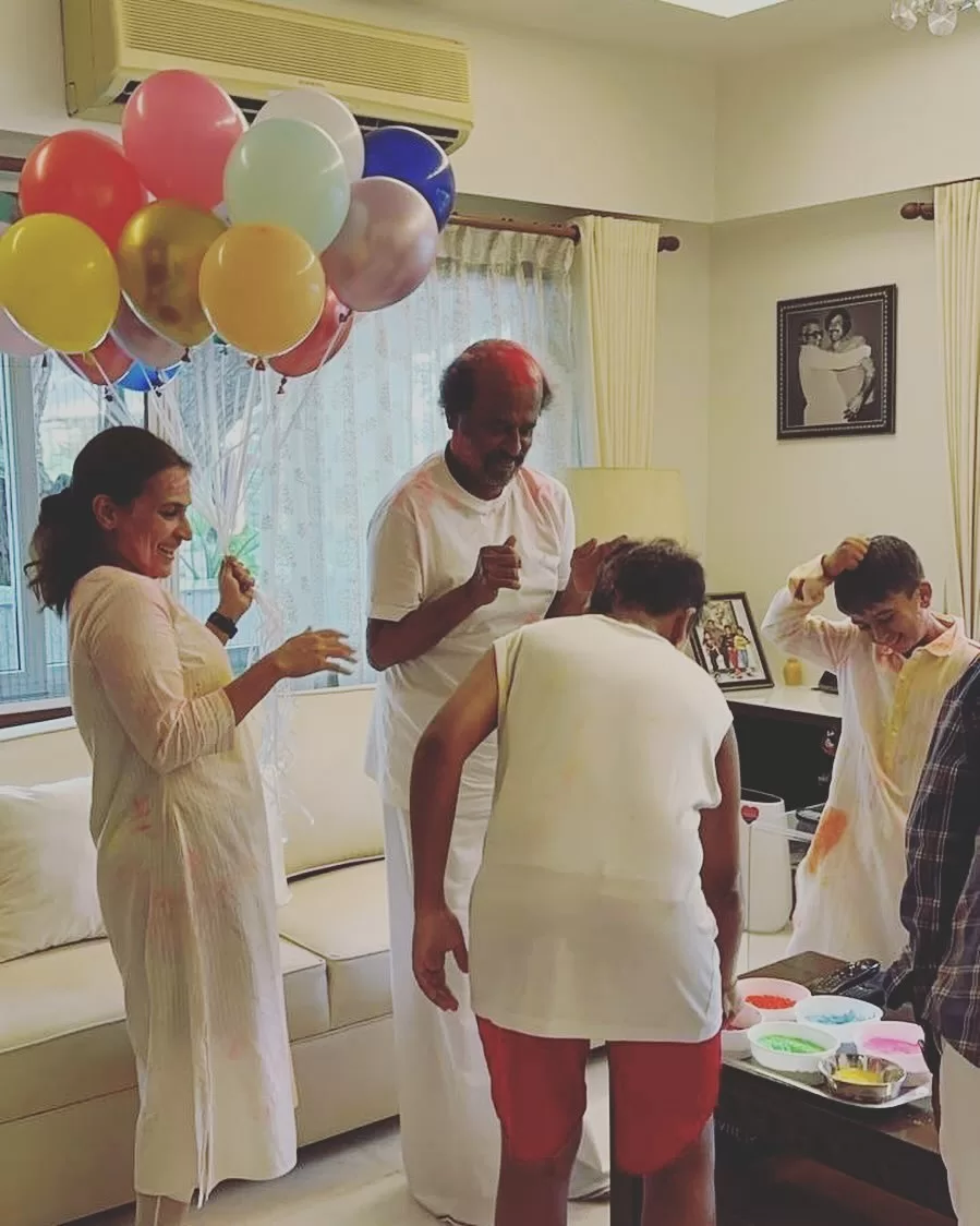 Superstar Rajinikanth having fun with his kids and grandchildren during Holi