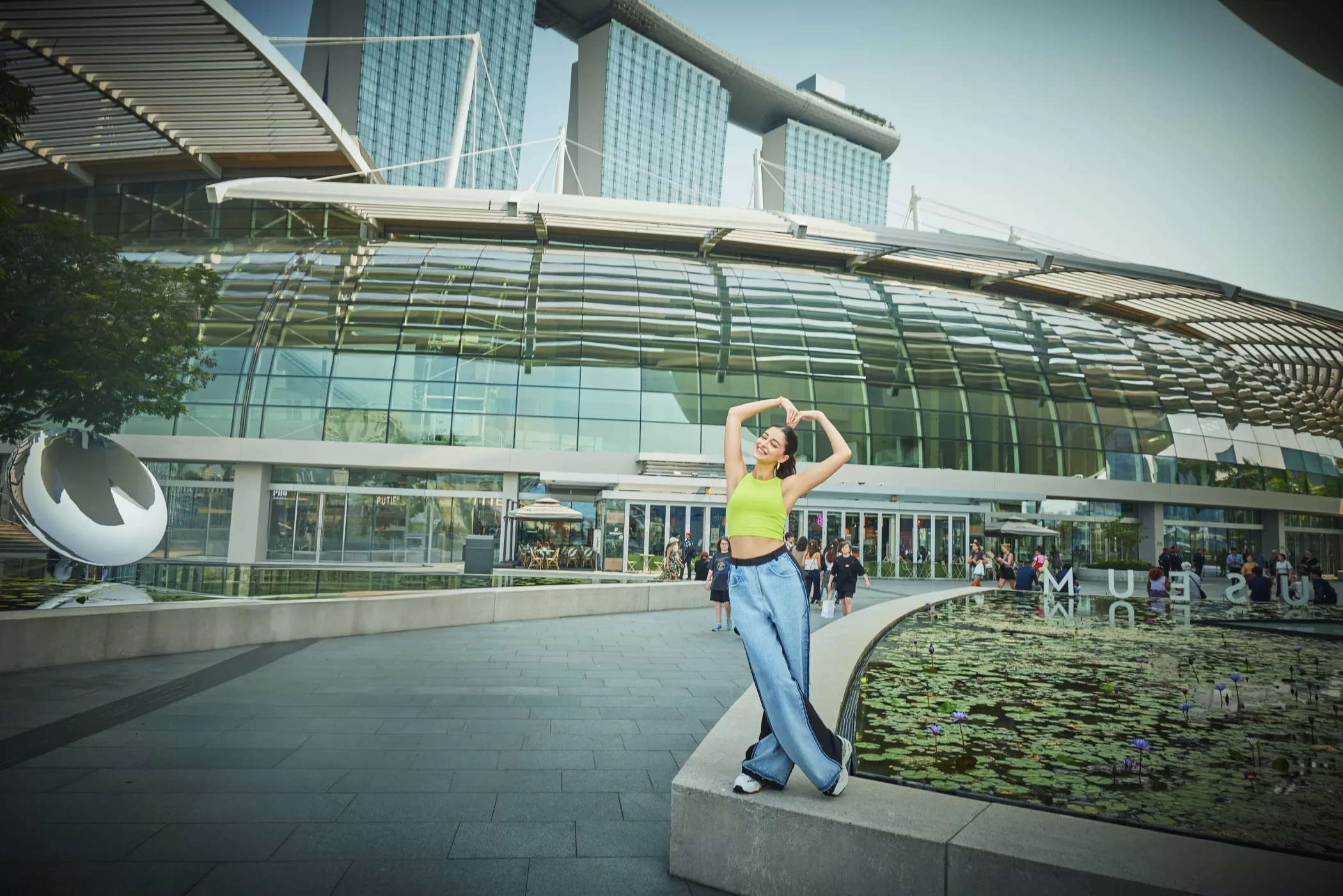 Ananya embraces love against the captivating backdrop of Marina Bay Sands, where architecture and grandeur converge in Singapore’s iconic skyline.