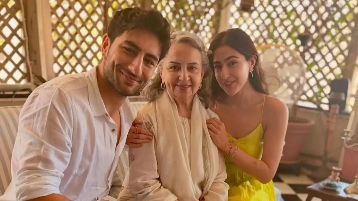 Sara with brother and grandmother